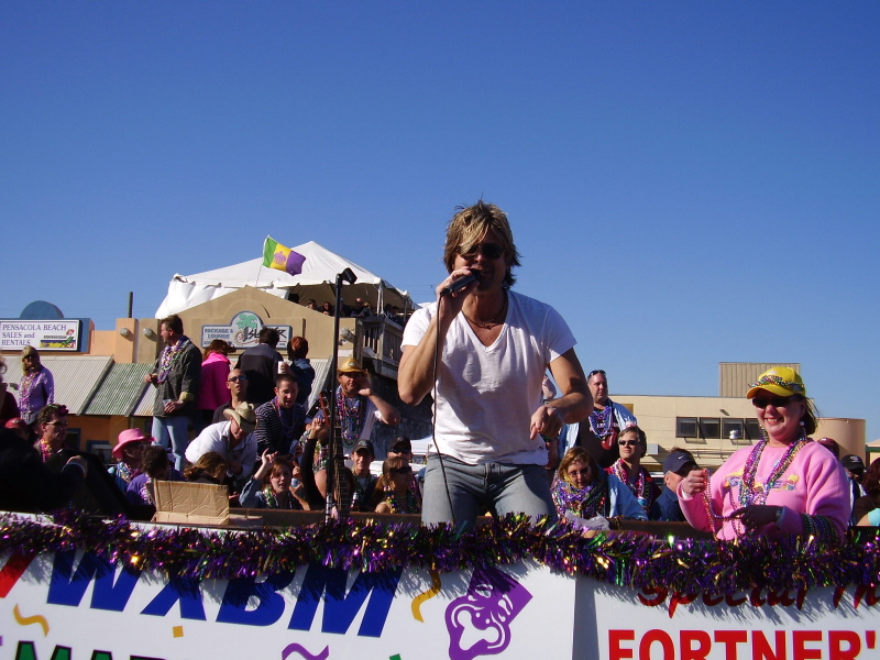 Woody Bradshaw performing on a Mardi Gras parade float
