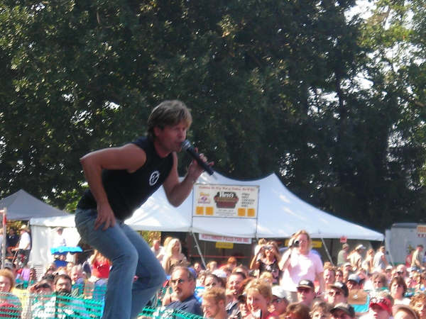 Woody Bradshaw performing to a large festival crowd